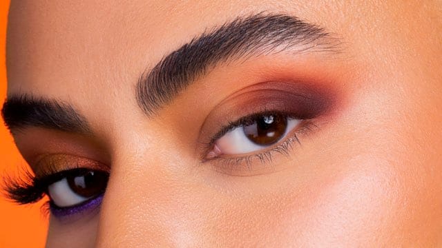 A macro frame of a blended copper and plum lid.